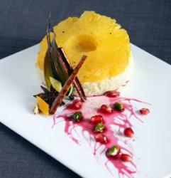 Spice Roasted Pineapple with Creamy Rice Conde and Pomegranate Syrup -